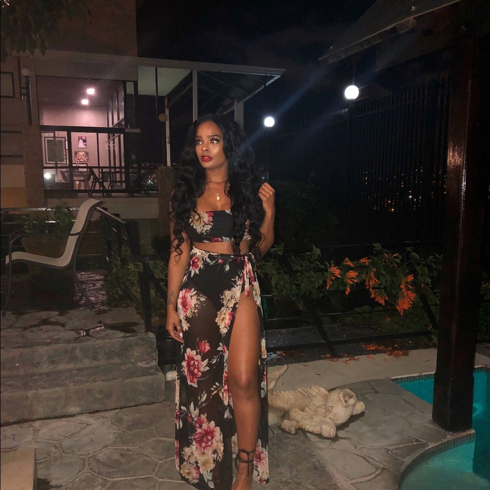 Two piece bandeau top with cover up skirt.